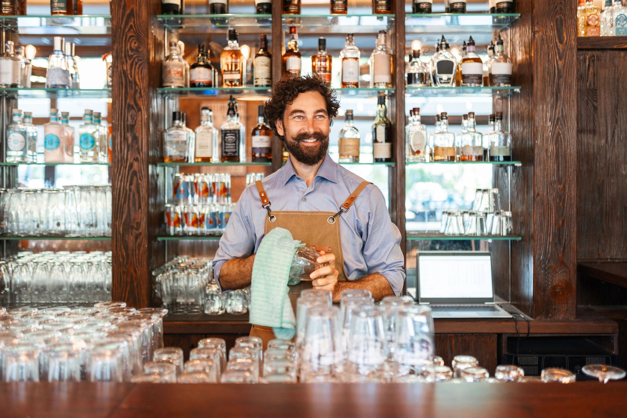 friendly bartender serving drinks