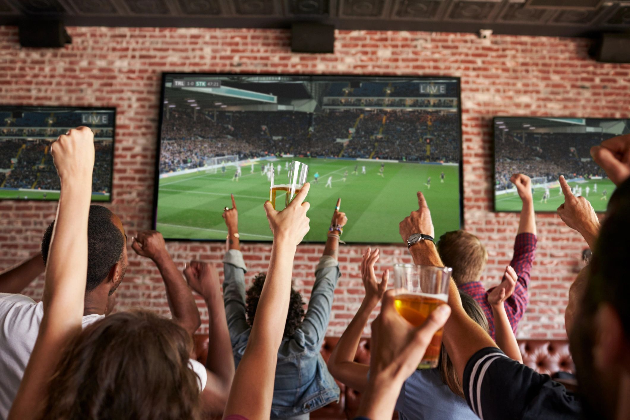 sports bar crowd watching soccer